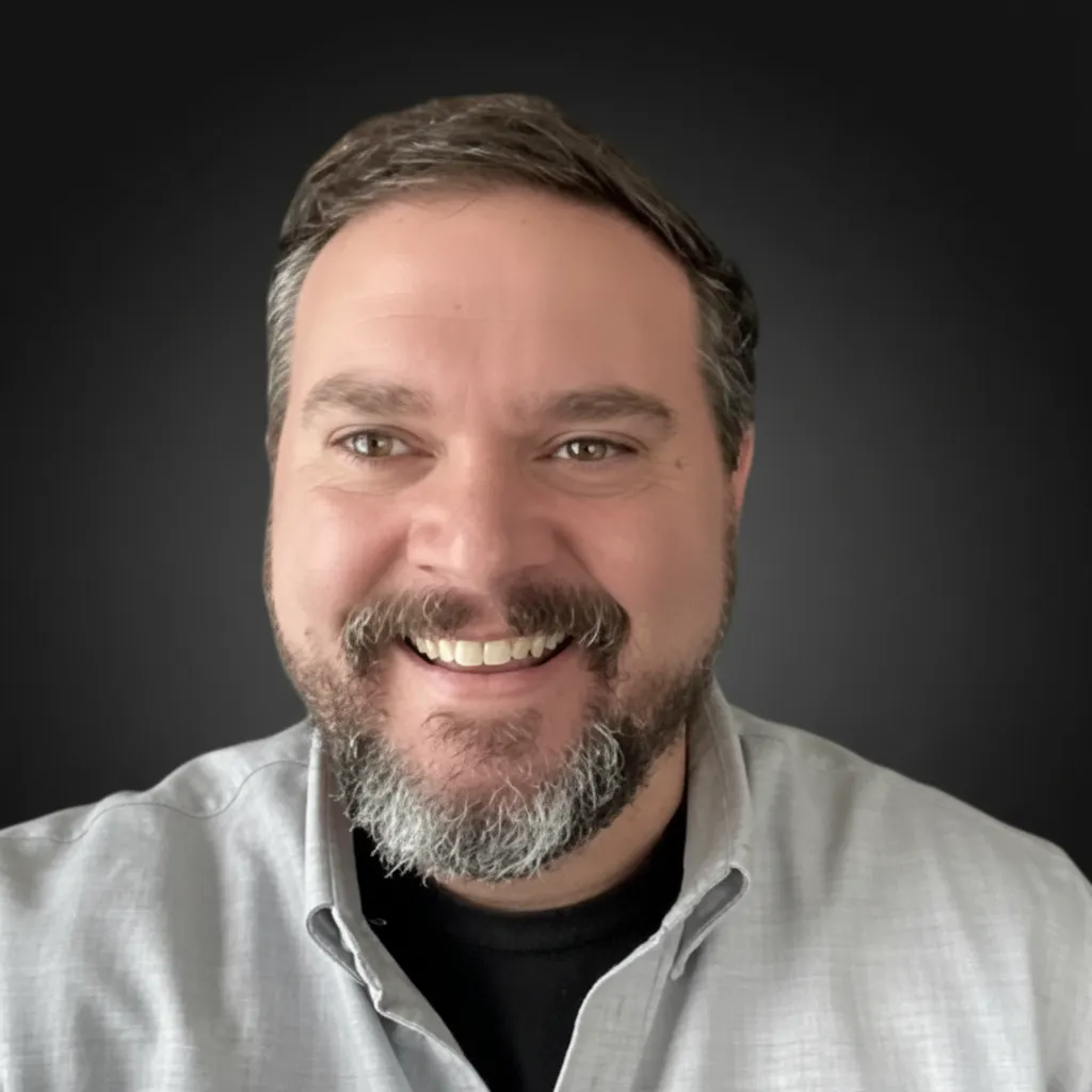 Portrait of Bill Playford, co-founder — Dealership floor and automotive operations